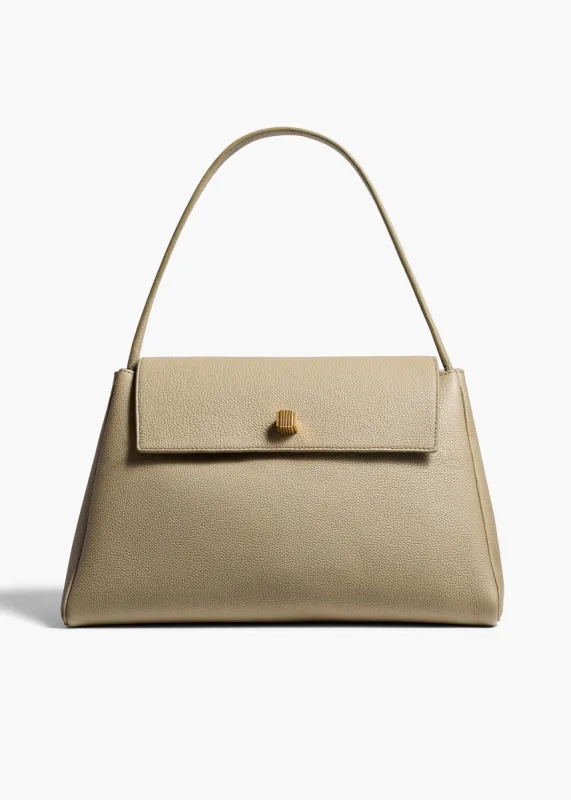 Audrey Top Handle Bag in Sage Pebbled Leather sold by KHAITE