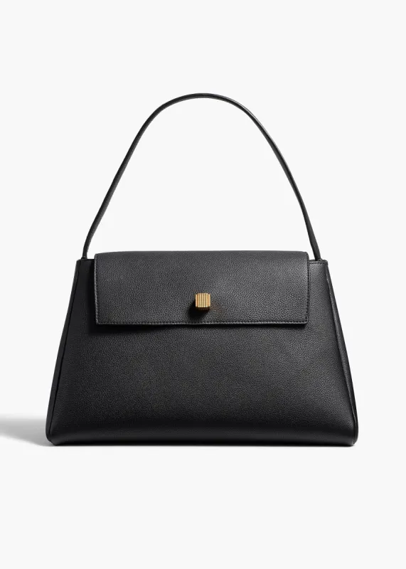 Audrey Top Handle Bag in Black Pebbled Leather sold by KHAITE