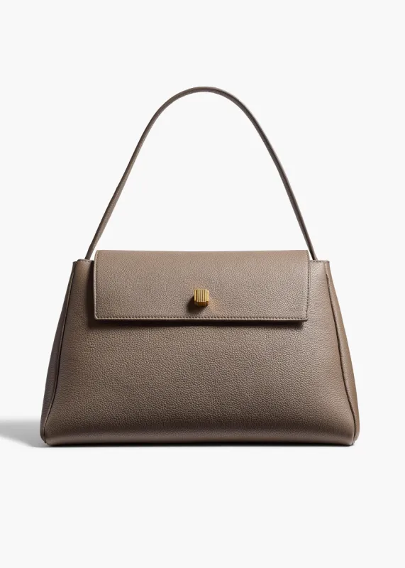 Audrey Top Handle Bag in Elephant Pebbled Leather sold by KHAITE