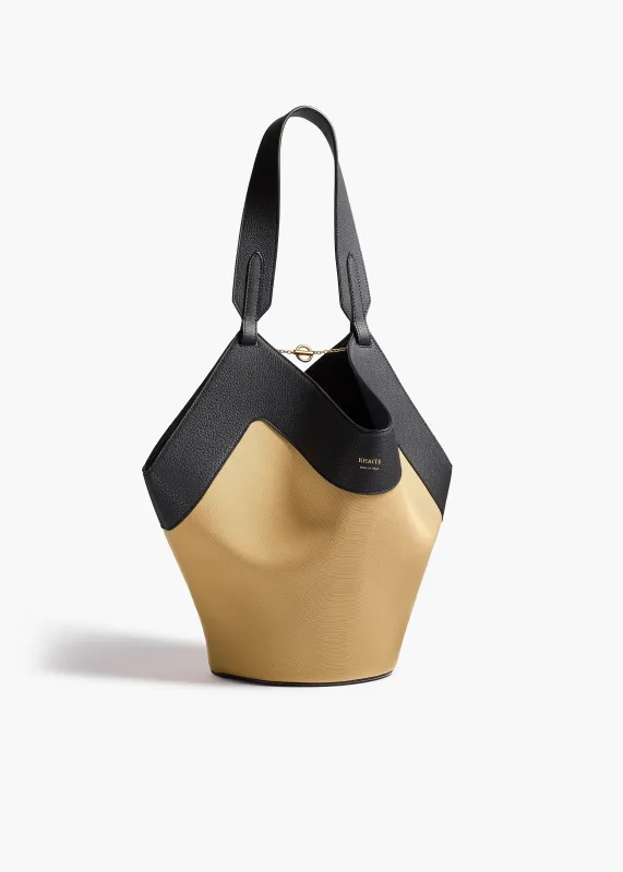 Small Lotus Tote in Honey Canvas with Black Leather sold by KHAITE