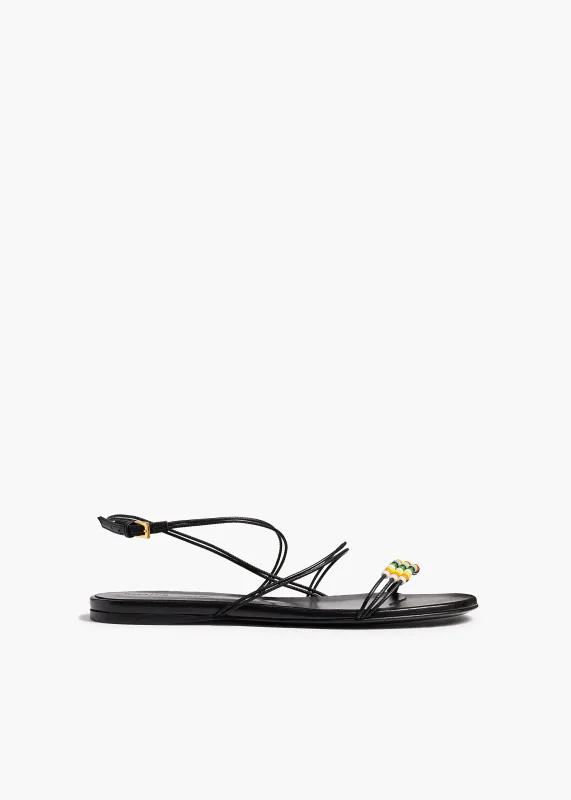 Loop Flat Sandal with Beads in Black Leather sold by KHAITE