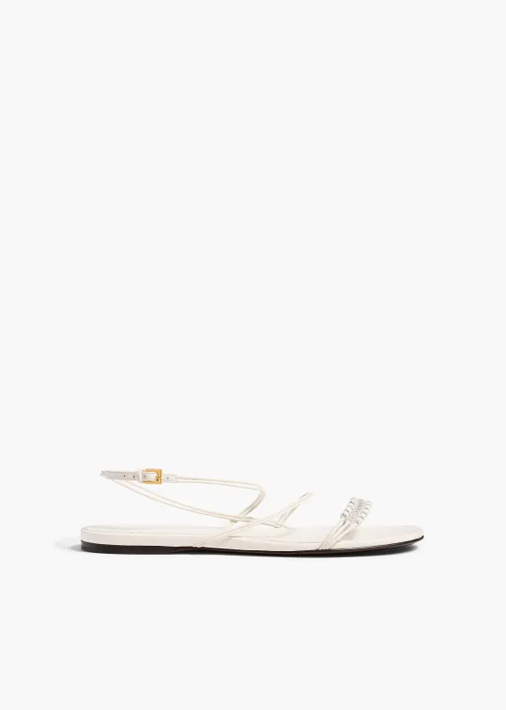 Loop Flat Sandal with Beads in Optic White Leather sold by KHAITE