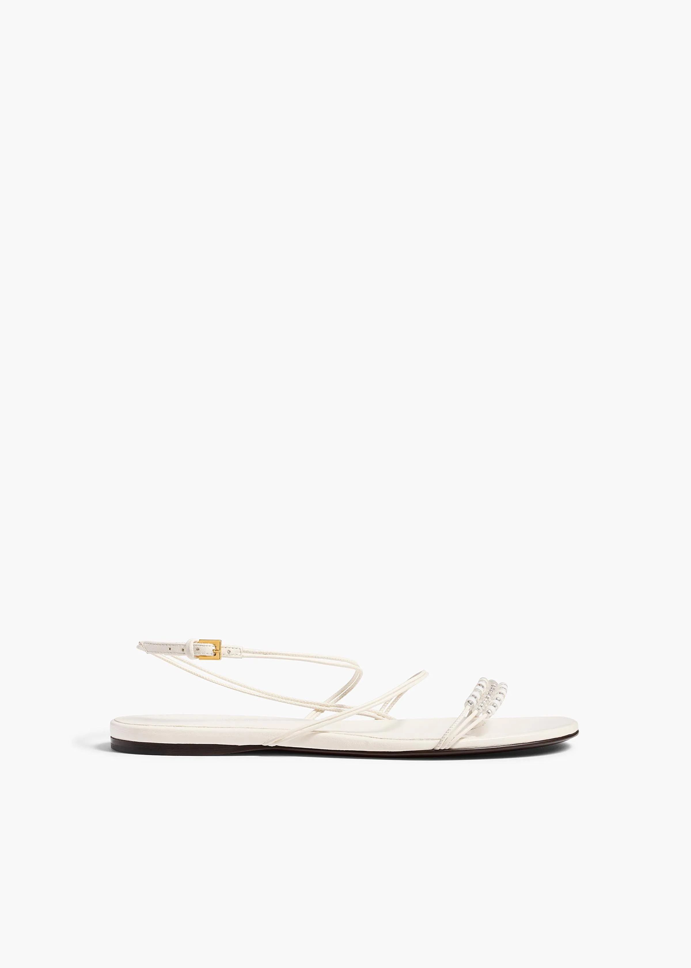 Loop Flat Sandal with Beads in Optic White Leather sold by KHAITE