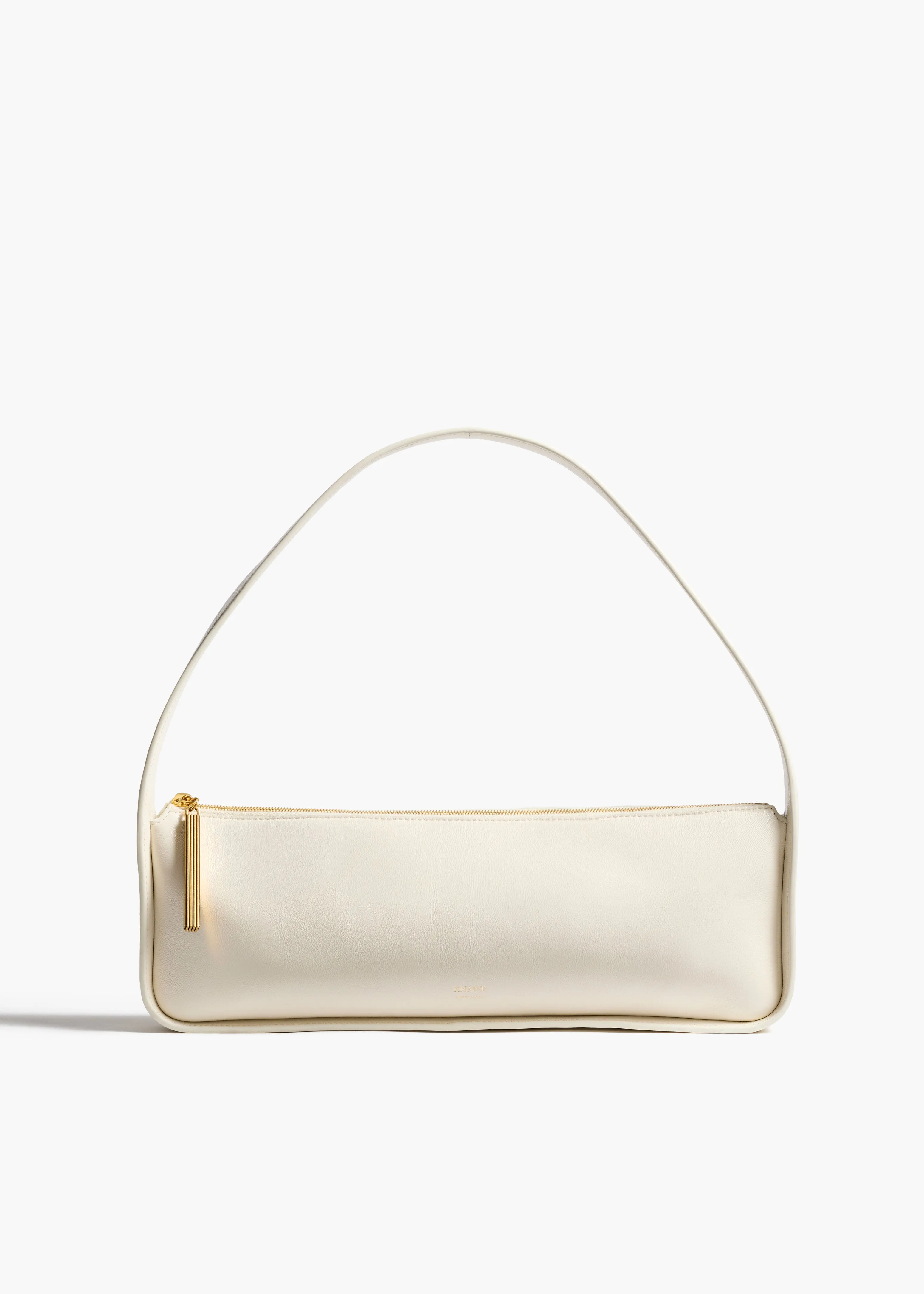 Lori Baguette Bag in Cream Crackle Patent Leather sold by KHAITE