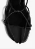 Loulou Flat Sandal in Black Leather sold by KHAITE