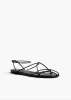 Loulou Flat Sandal in Black Leather sold by KHAITE