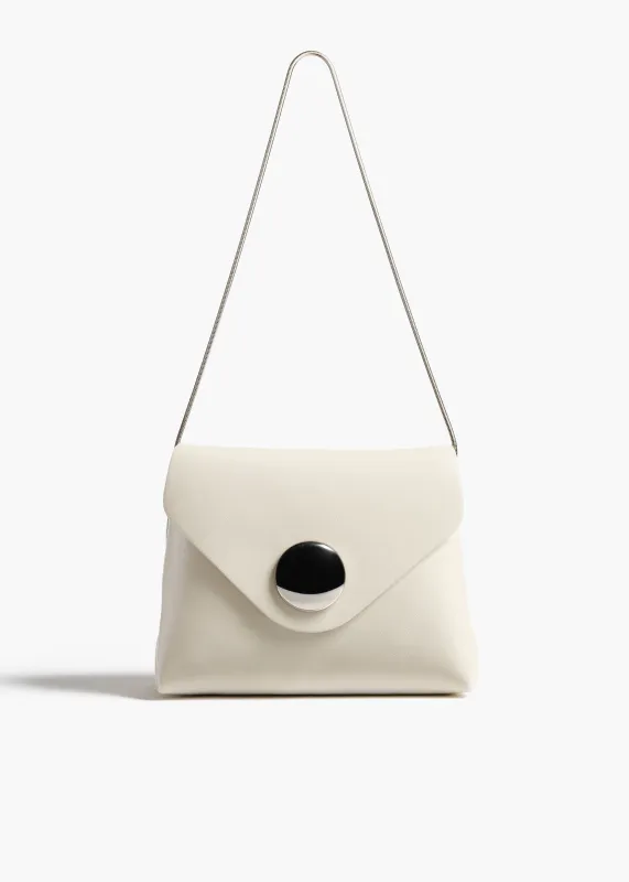 Bobbi Bag in Cream Crackle Patent Leather sold by KHAITE
