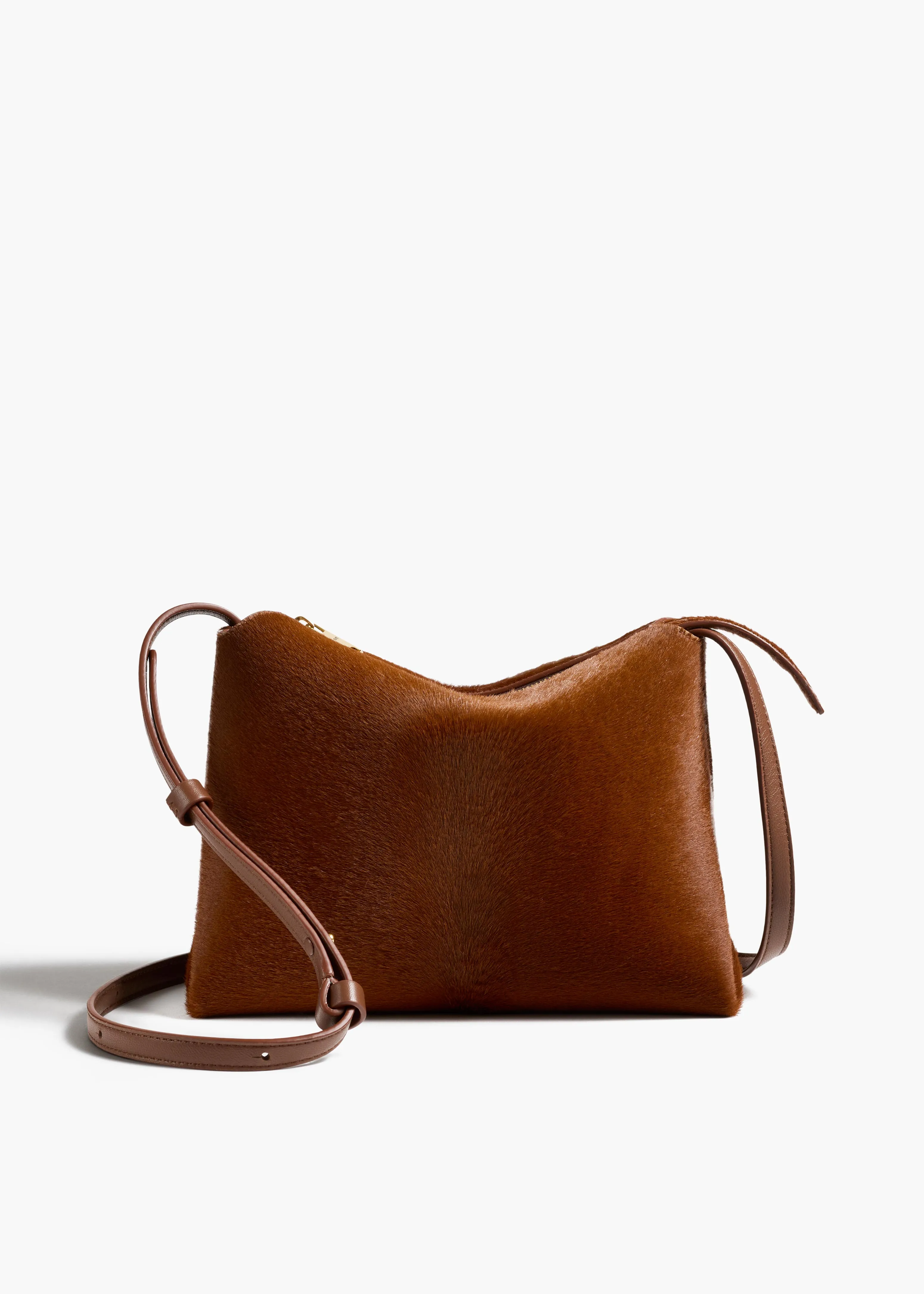 Lina Crossbody Bag in Rust Haircalf sold by KHAITE