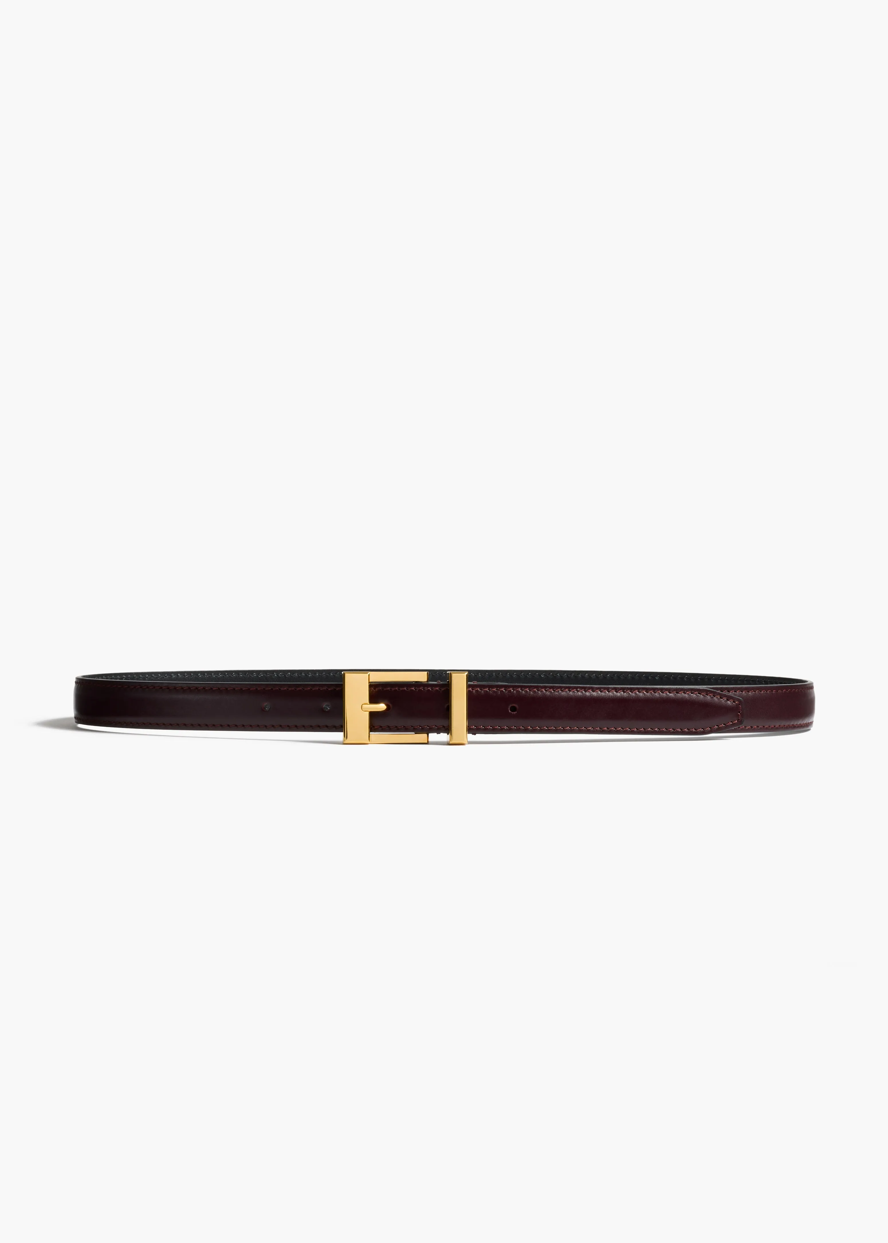 Manhattan Belt in Bordeaux Leather with Gold sold by KHAITE