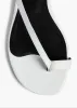 Aimee Flat Sandal in Optic White Leather sold by KHAITE