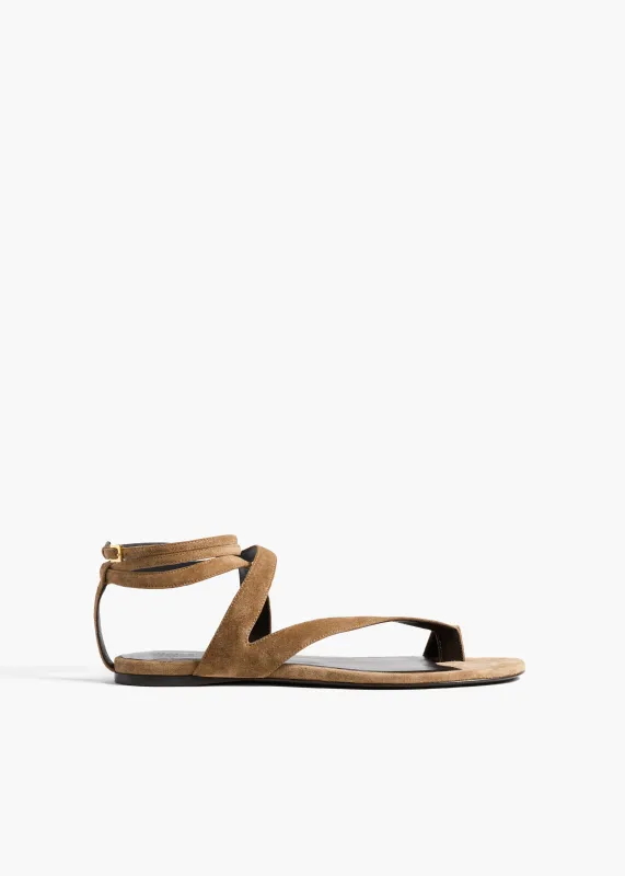 Aimee Ankle Strap Flat Sandal in Taupe Suede sold by KHAITE