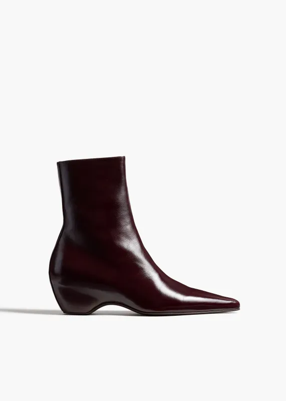 Sybil Ankle Boot in Bordeaux Glazed Leather sold by KHAITE