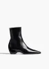 Sybil Ankle Boot in Black Glazed Leather sold by KHAITE