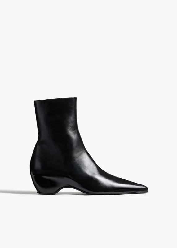 Sybil Ankle Boot in Black Glazed Leather sold by KHAITE