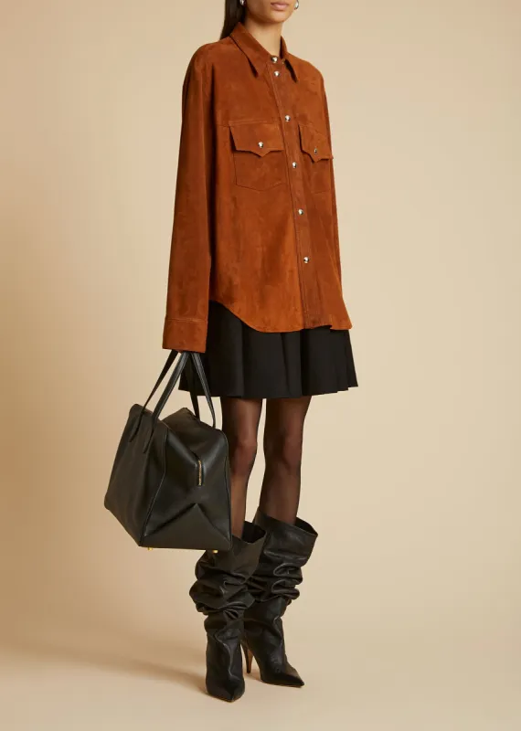 The Ulli Skirt in Black sold by KHAITE