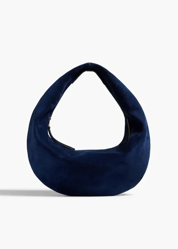 Medium Olivia Hobo in Midnight Suede sold by KHAITE