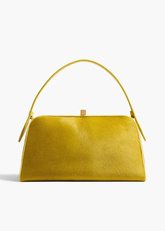 Cate Bag in Fern Haircalf sold by KHAITE