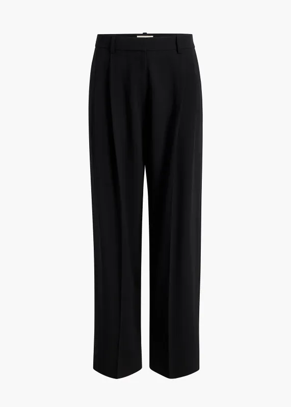August Pant in Black sold by KHAITE