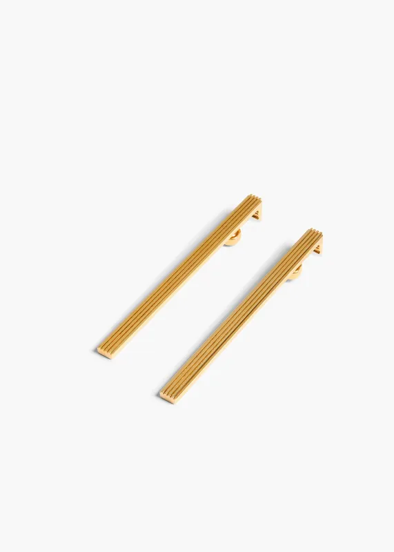 Empire Long Earrings in Gold sold by KHAITE