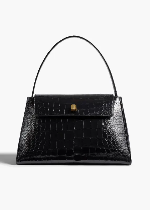 Audrey Top Handle Bag in Black Alligator sold by KHAITE