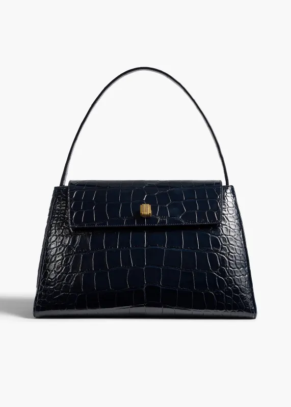 Audrey Top Handle Bag in Midnight Alligator sold by KHAITE