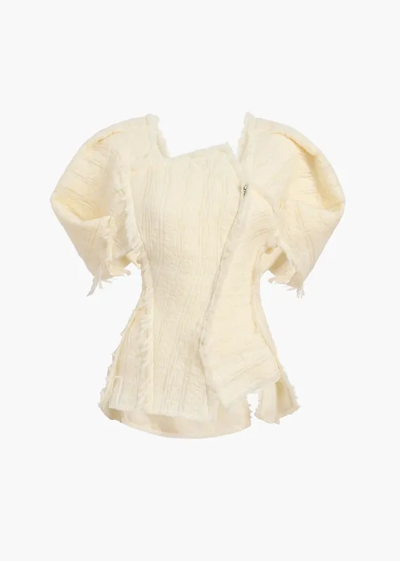 Quan Top in Ivory sold by KHAITE