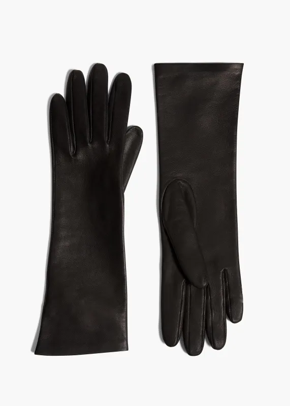 Remo Mid-Length Gloves in Black Leather sold by KHAITE