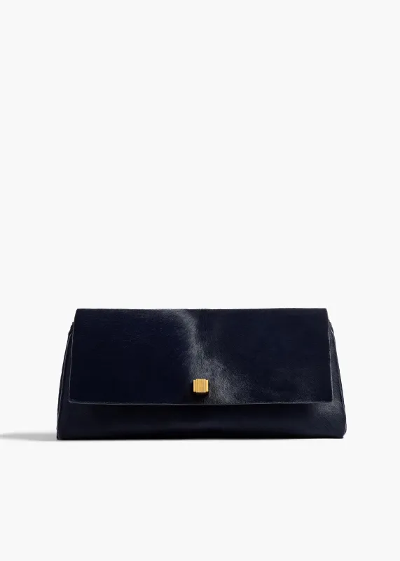 Audrey Clutch in Midnight Haircalf sold by KHAITE