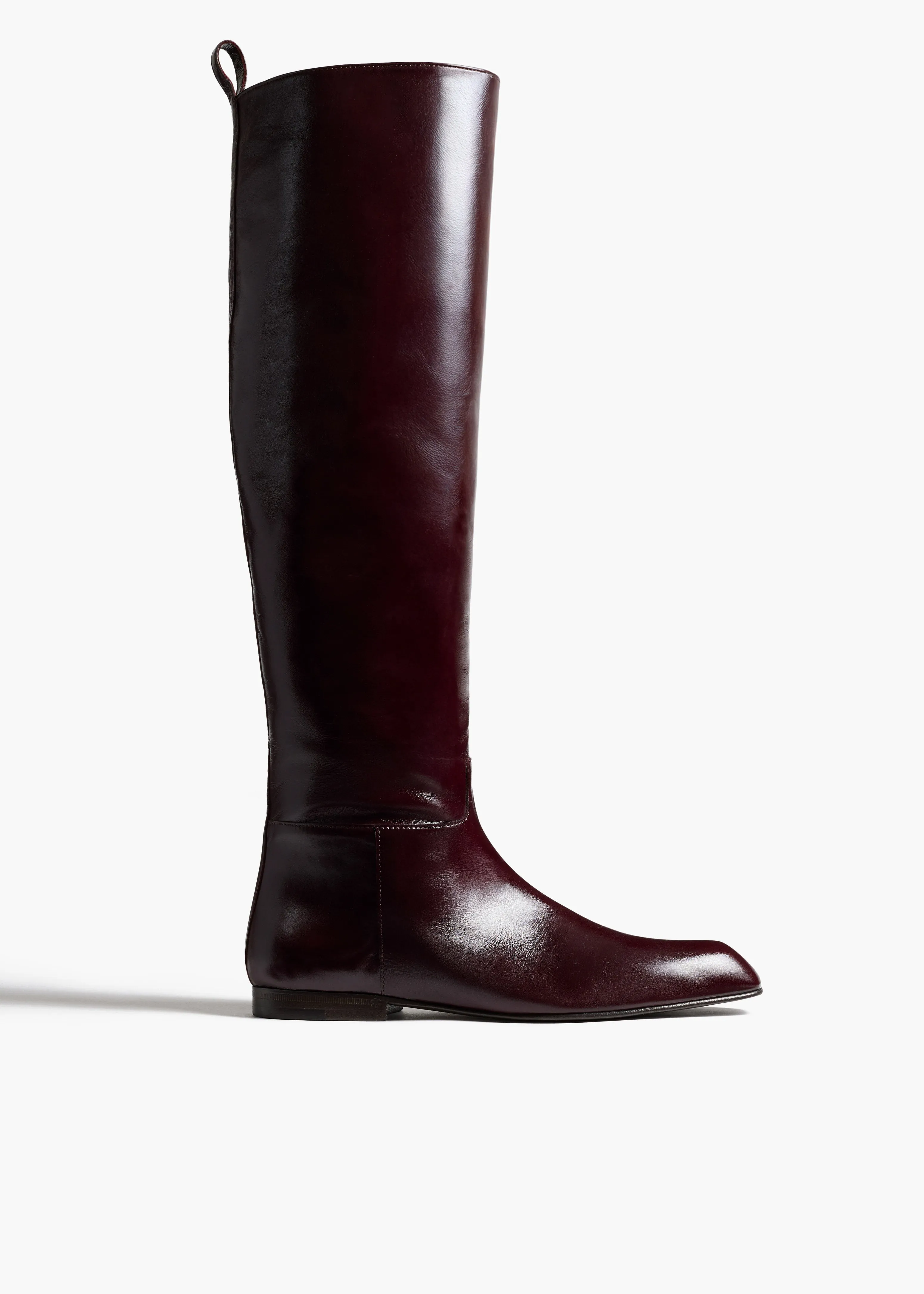 Colt Knee-High Boot in Bordeaux Glazed Leather sold by KHAITE