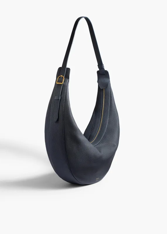 Augustina Hobo in Midnight Pebbled Leather sold by KHAITE