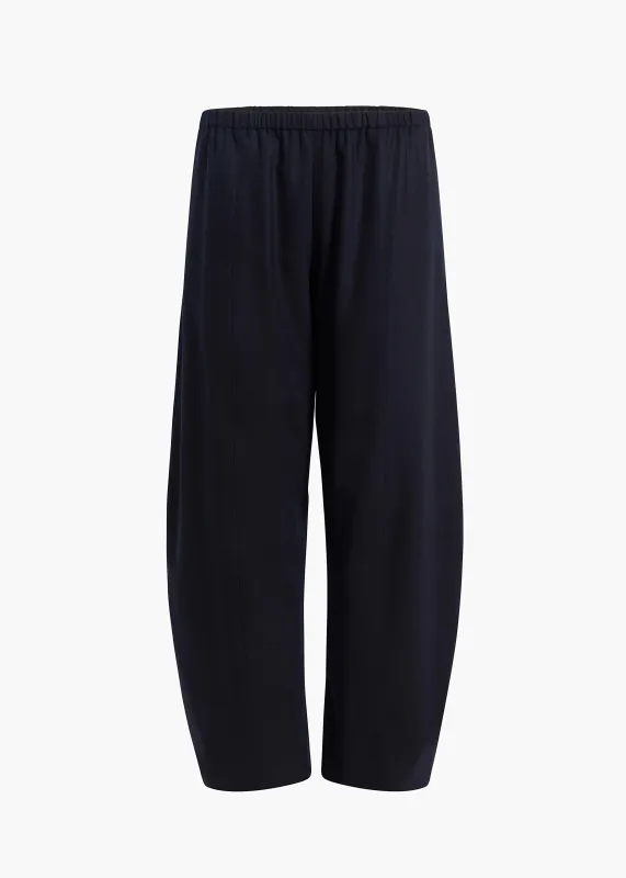 Clover Pant in Dark Navy sold by KHAITE