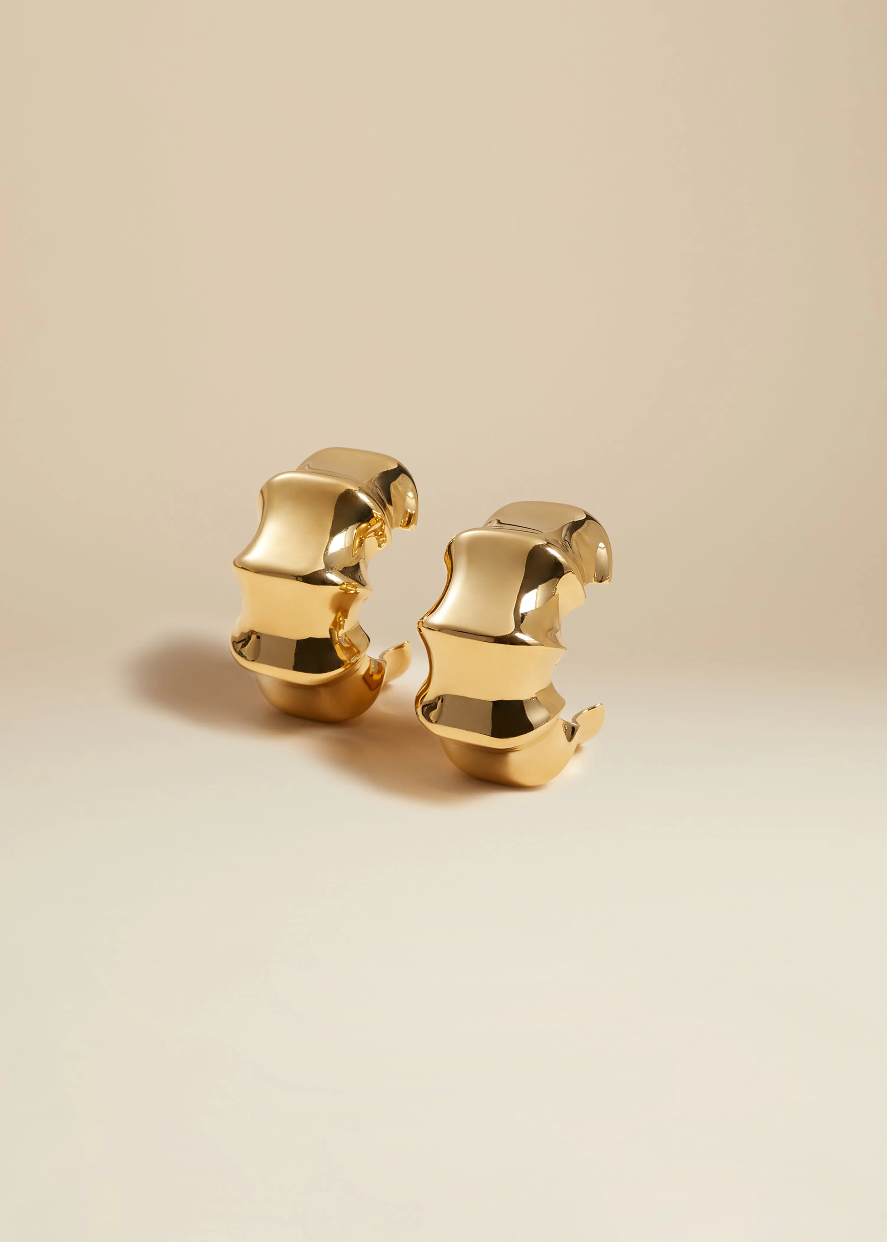 Medium Julius Loop Earrings in Gold sold by KHAITE