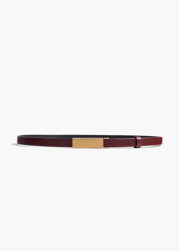 Empire Belt in Oxblood Leather with Gold sold by KHAITE