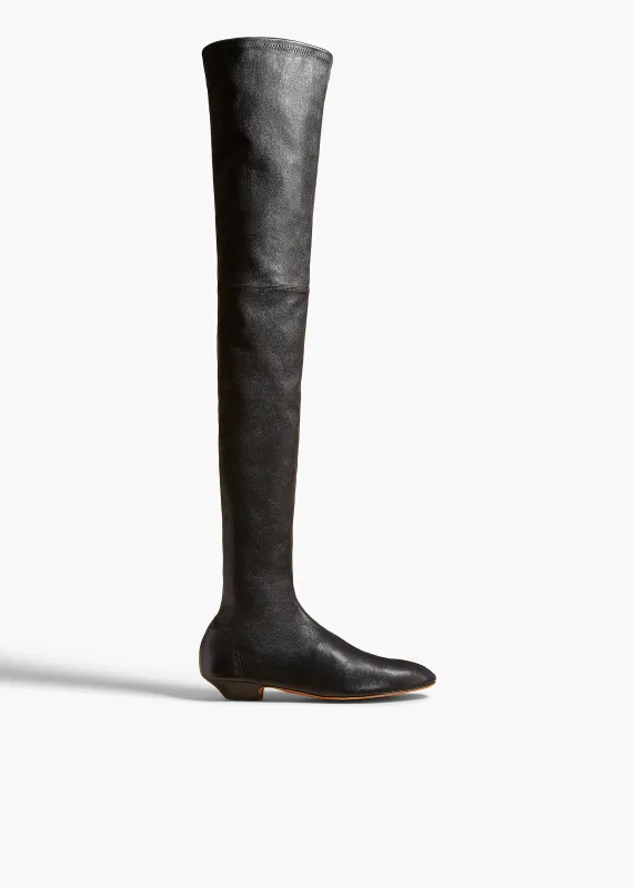 Apollo Over-the-Knee Flat Boot in Black Leather sold by KHAITE