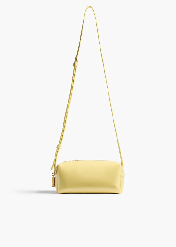 Mini Kye Crossbody Bag in Pale Yellow Crackle Patent Leather sold by KHAITE