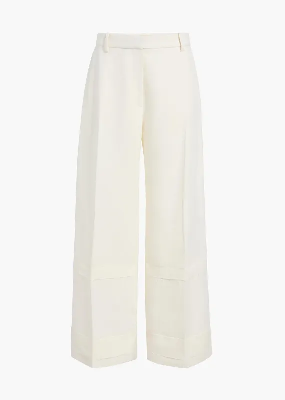 Linden Pant in Cream sold by KHAITE
