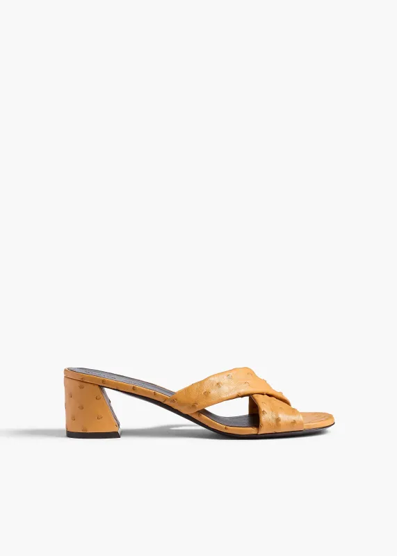 Liria Sandal in Chestnut Ostrich sold by KHAITE