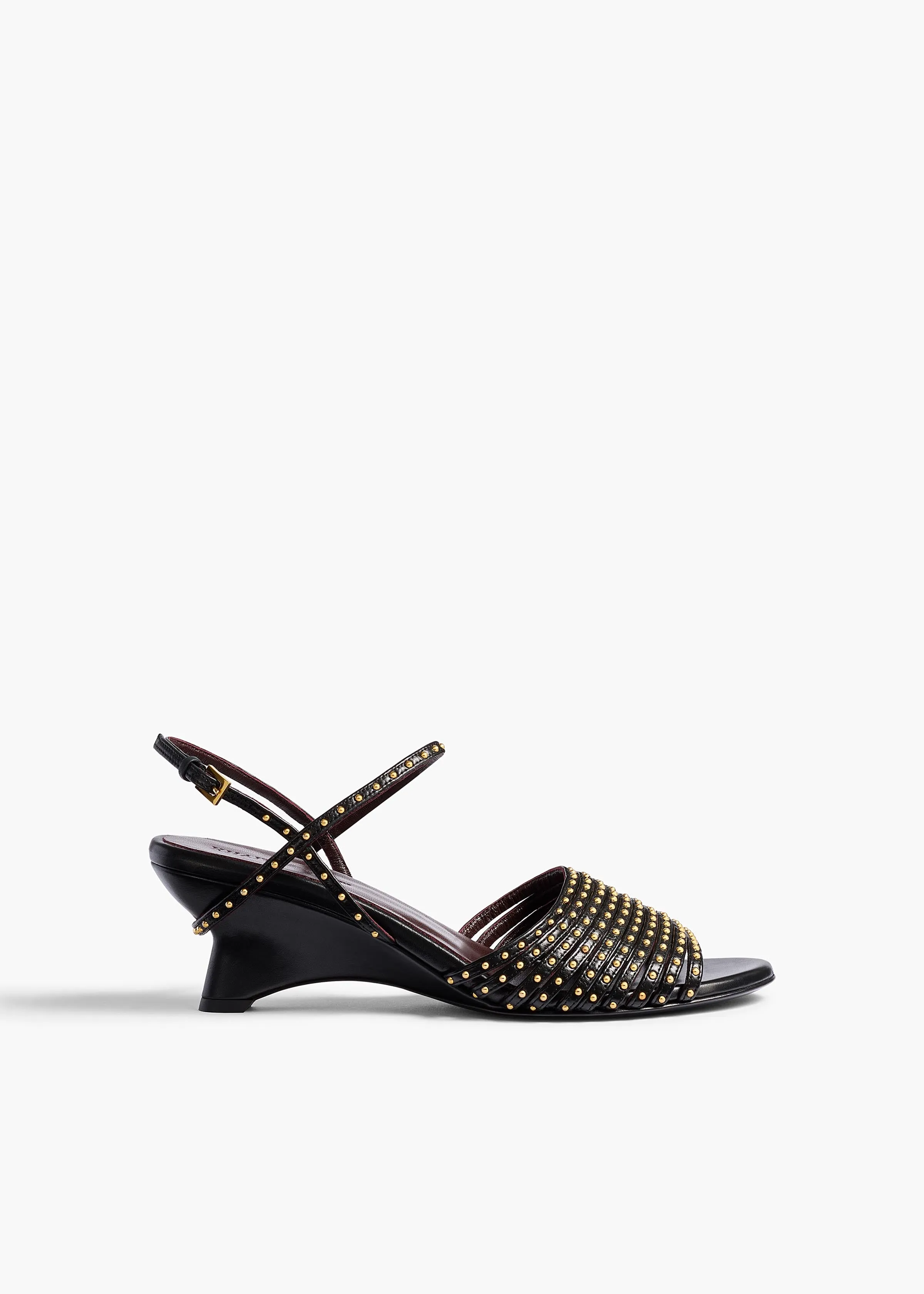 Drew Sandal in Black Leather with Gold Studs sold by KHAITE