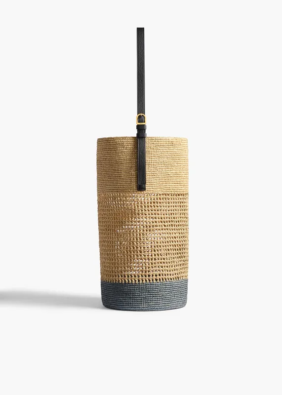 Billie Bucket Bag in Natural and Lead Raffia sold by KHAITE