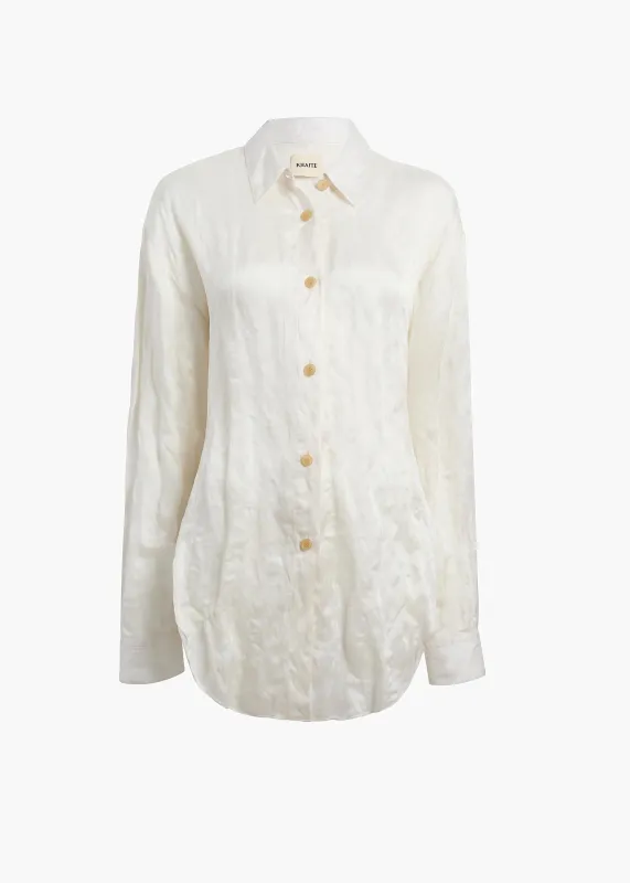 Goya Top in Chalk sold by KHAITE