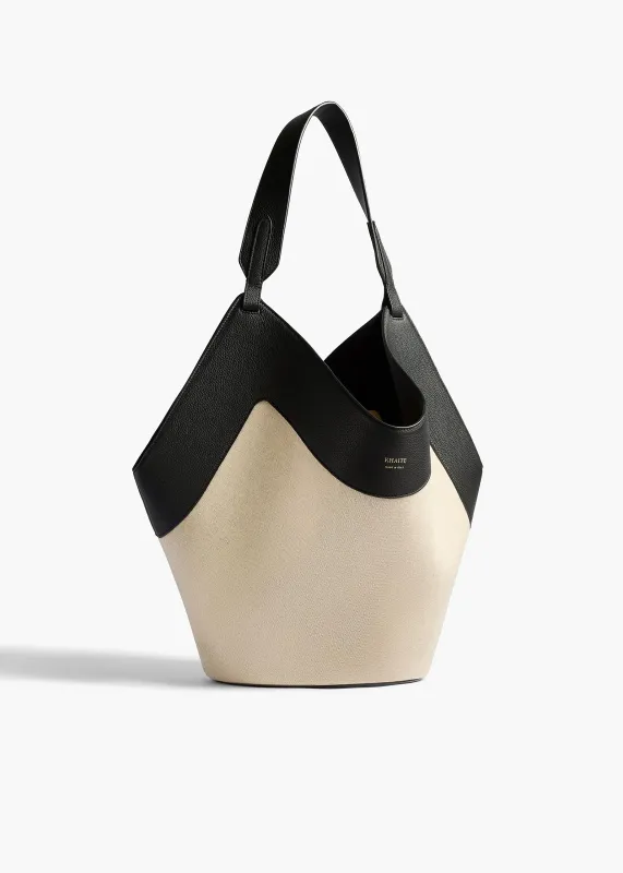 Medium Lotus Tote in Black Leather and Natural Canvas sold by KHAITE