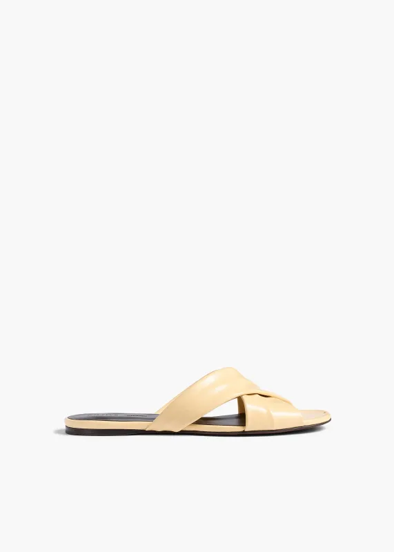 Liria Flat Sandal in Butter Glazed Leather made by KHAITE