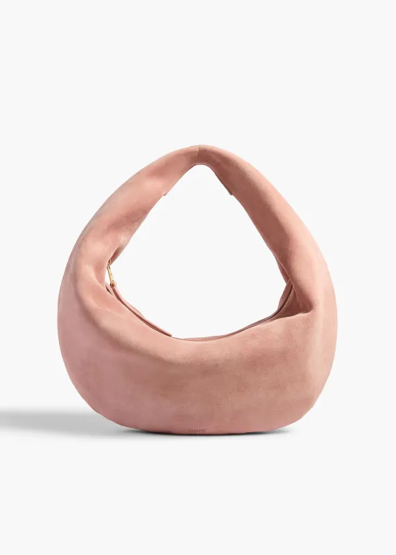 Medium Olivia Hobo in Dusty Pink Suede sold by KHAITE