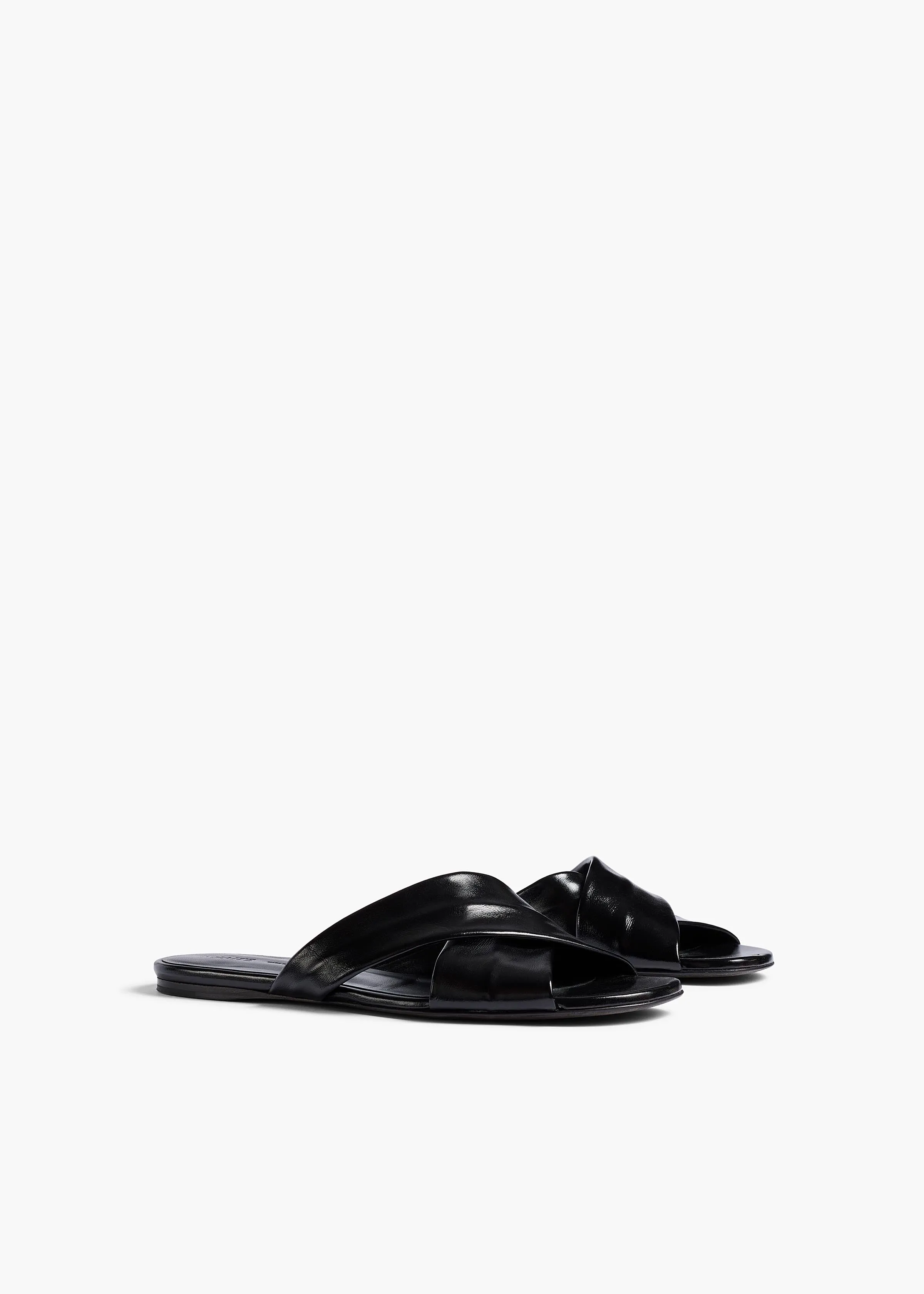 Liria Flat Sandal in Black Glazed Leather sold by KHAITE product image thumbnail 2