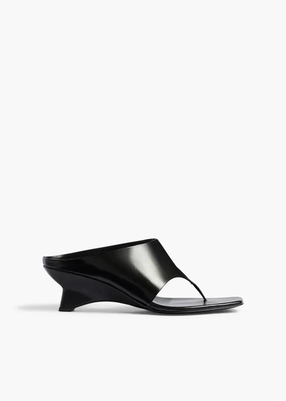 Marlow Mule in Black Glazed Leather sold by KHAITE