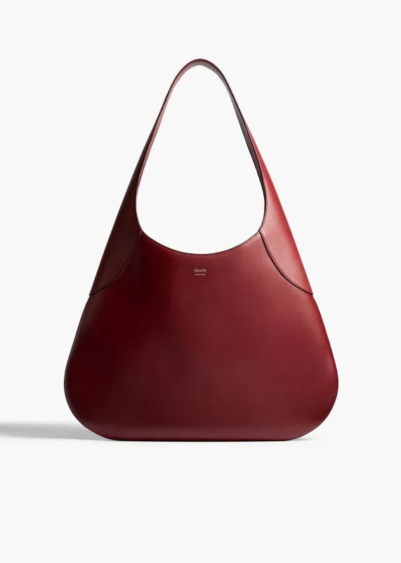 Large Joan Hobo in Oxblood Leather sold by KHAITE
