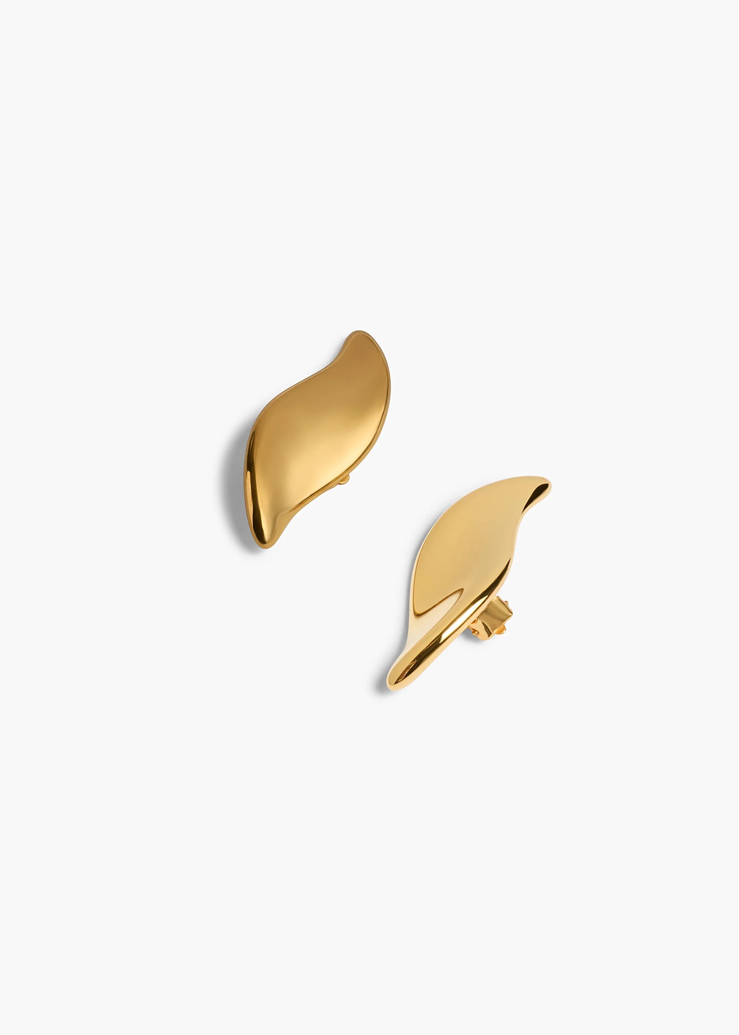 Leaf Earrings in Gold sold by KHAITE
