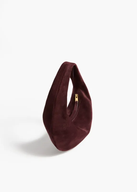 Mini Olivia Hobo in Rouge Noir Suede made by KHAITE