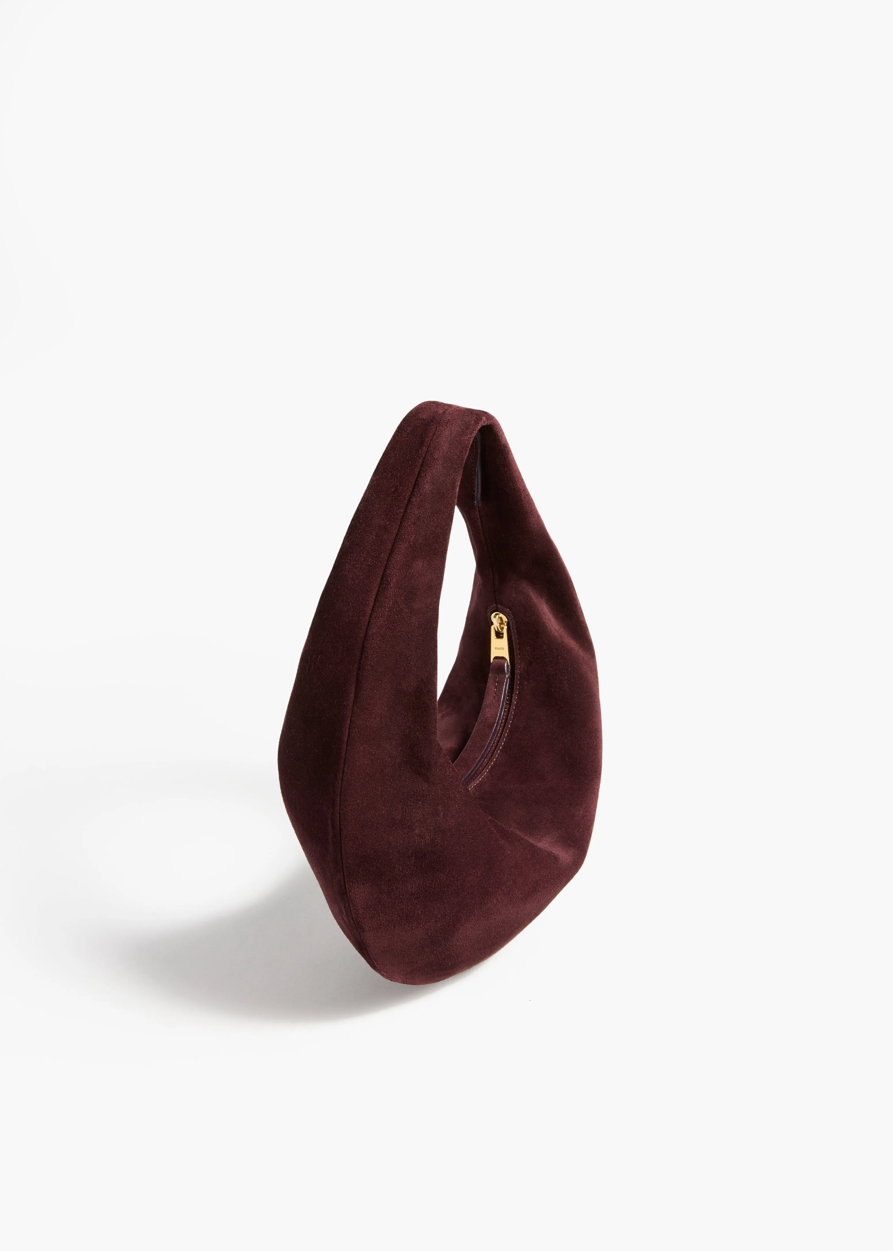 Mini Olivia Hobo in Rouge Noir Suede sold by KHAITE