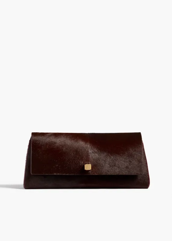 Audrey Clutch in Rouge Noir Haircalf made by KHAITE
